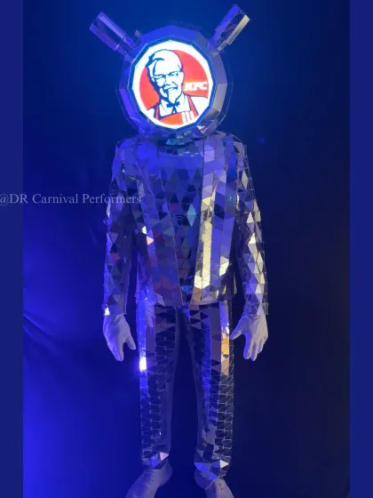 A futuristic twist on a classic act. Our Mirror Man with a custom TV head, here displaying the KFC logo for a corporate brand activation.