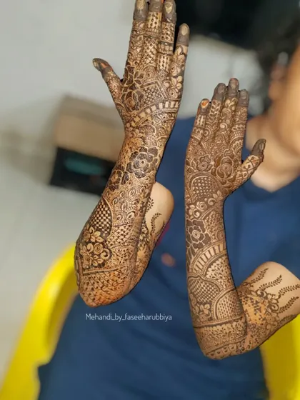 This angle shows the beautiful wrap-around effect of the henna design on the arms.