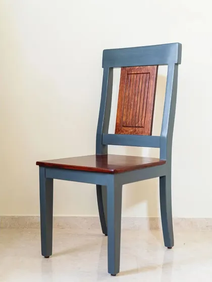 The study chair, with its two-tone finish, is designed to be both ergonomic and stylish.