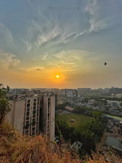 The view of the Andheri cityscape at sunset from the ancient Gilbert Hill.