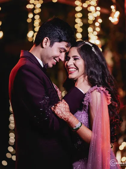 Pure happiness captured in a candid moment. The laughter and joy in this photo are what make wedding events so special.
