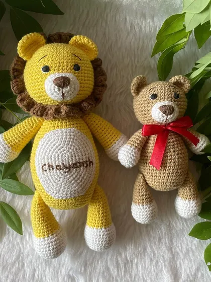 A personalized lion plushie with the name "Chayansh" embroidered on his belly. This sunny yellow lion is ready to be a brave and loyal friend.