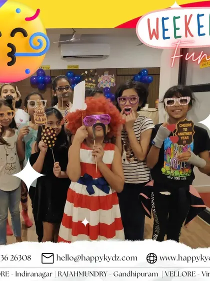 A group of friends celebrating together with fun party props. Our play zone is the perfect backdrop for a memorable birthday party or weekend get-together.