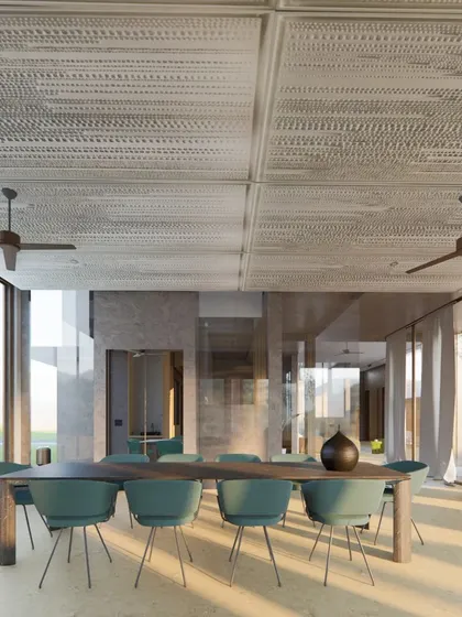 The dining area in the Sanctuary Residence is envisioned as a glass pavilion. Floor-to-ceiling windows on all sides and a textured ceiling create a space that allows dwellers to dine while fully immersed in the natural surroundings.