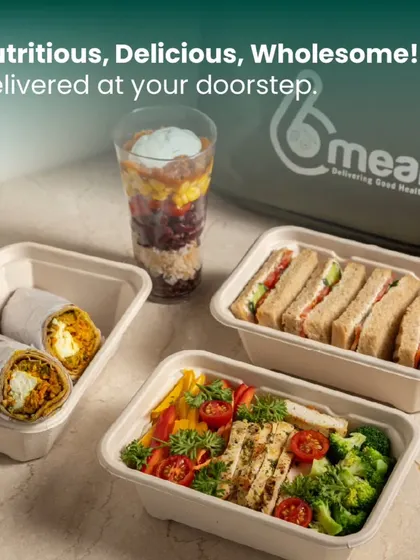 This image perfectly captures the essence of our service: nutritious, delicious, and wholesome meals delivered right to your doorstep. From salads and sandwiches to parfaits, we've got your entire day covered.