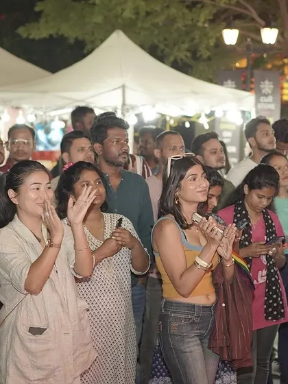 The amazing audience at the Pride event, clapping and showing their support. The energy from the crowd fuels everything we do.