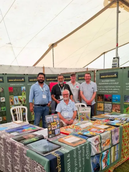 The Asian Adventures team posing at our stall. We bring decades of experience in birding, culture, and conservation to the global stage.
