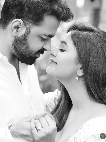 The near-kiss pose is full of romantic tension. Capturing this in black and white makes it feel even more classic and cinematic.
