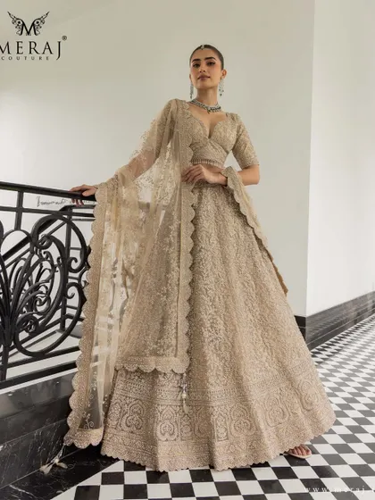 Elegance in every inch. This golden lehenga from the 'Ruvaah' collection is a masterpiece of heritage craftsmanship, featuring intricate thread embroidery and delicate zardosi.