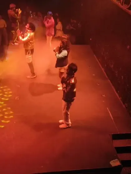 A view from above the stage at the 'Let Loose' event, showing the dramatic lighting and smoke effects that add to the high-energy atmosphere.