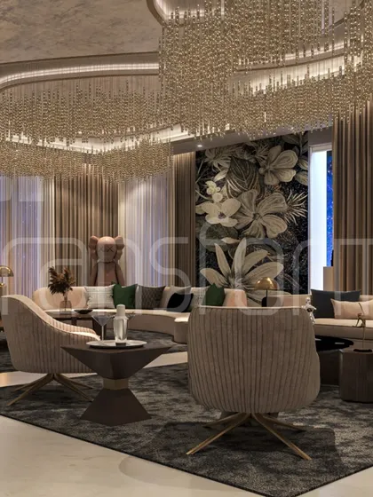 Another view of the grand living room, showing the relationship between the curved sofa, the dark rug, and the statement art piece. The space is designed for both large gatherings and intimate moments.