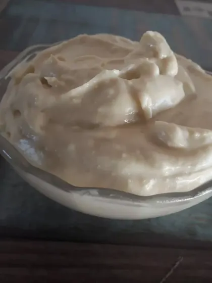 A bowl of my newly developed vegan cheese sauce. It's thick, creamy, and has that savory flavour that is perfect for using in dishes like Khachapuri, pasta, or as a dip.