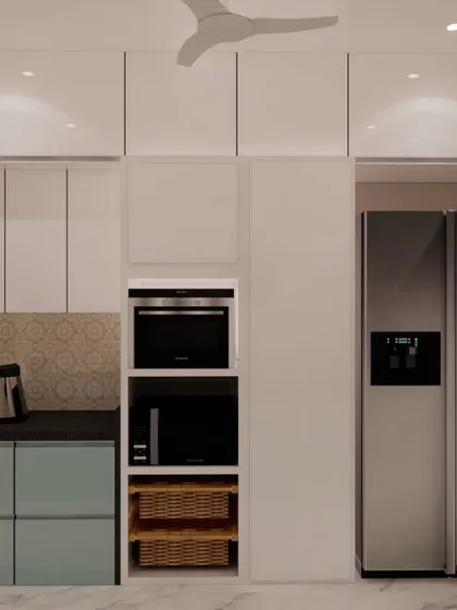 This view shows the tall appliance unit designed for the same kitchen, with dedicated spaces for a built-in oven and microwave. The open wicker baskets below are a practical solution for storing onions and potatoes.