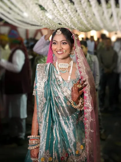 The joy on her face is the best testament to a successful bridal look.