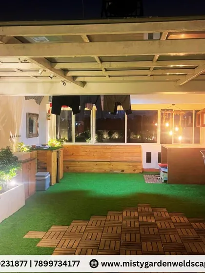 A complete view of the Banashankari terrace makeover, showing how we created a multi-functional space with a seating area, greenery, and even a clothesline integrated under the pergola.