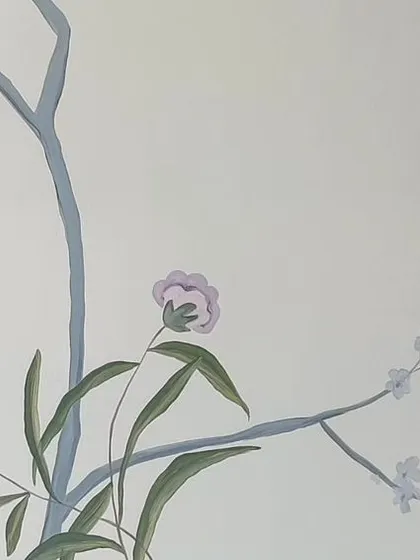 A duplicate image of the bird and butterfly detail.