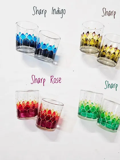 This graphic showcases the 'Sharp' design for the tea light cups, which has a pointed, petal-like pattern. It's available in Indigo, Olive, Rose, and Green.