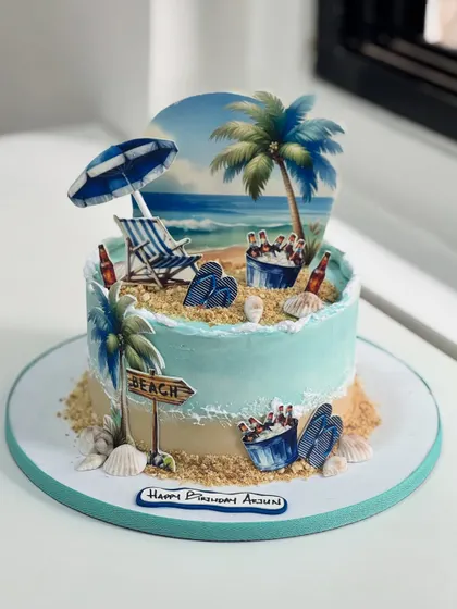 Beach vibes, but make it cake. This design brings a relaxing beach scene to life with palm trees, an umbrella, and even a cooler of beers, perfect for someone who loves the sea.