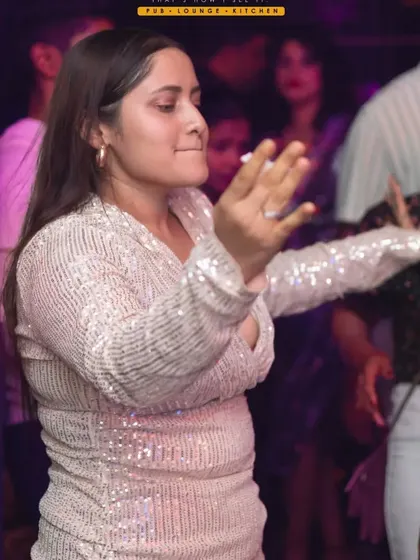 A guest dancing with style and flair. My music inspires people to express themselves on the dance floor.