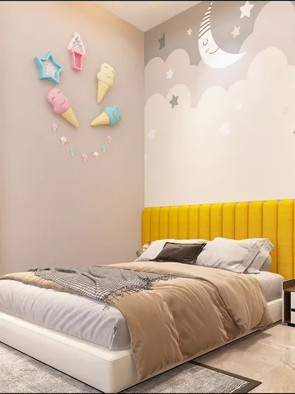 A closer look at the dreamy wall mural and vibrant yellow headboard that make this room so special.