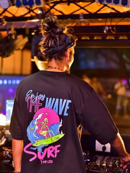 A duplicate of image 68, capturing the vibe from behind the decks as I look out at the party.