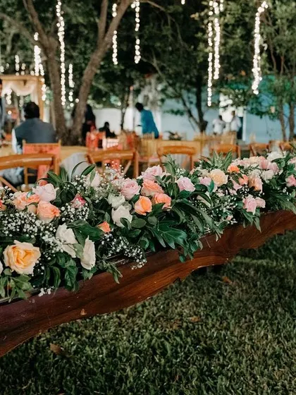 Another view of the stunning floral runners on the dining tables, perfect for an enchanted evening celebration.