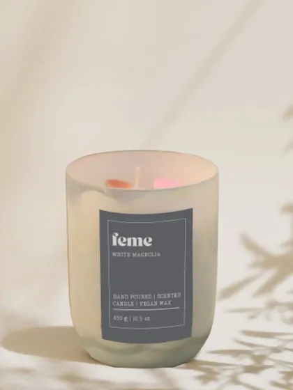 Unwind and relax with the enchanting aroma of our 'White Magnolia' candle in a holographic jar.
