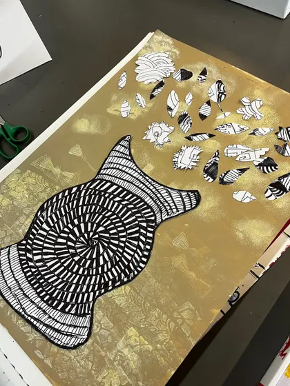 An abstract still life takes shape, with patterned pieces appearing to float away from the main object.