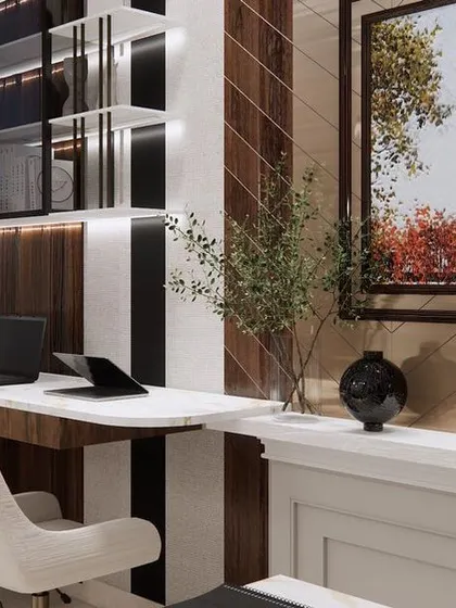 A detail shot of the workstation, highlighting the mix of materials including wood, marble, and metal. The large window provides plenty of natural light, creating a pleasant work environment.