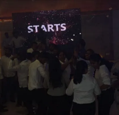 The party starts with visuals on the LED screen, building anticipation for the night ahead.