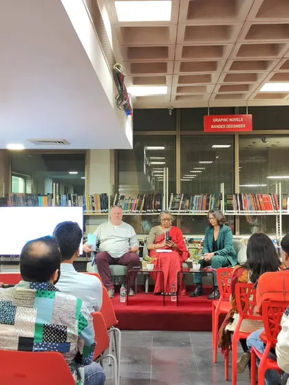The audience listens attentively during the talk on Quebec comics. Our library events attract a curious and engaged community of learners and art lovers.
