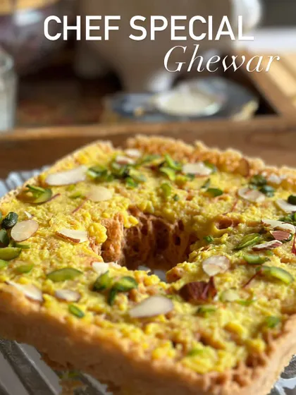 My Chef's Special Ghewar for the festival of Teej. This traditional Rajasthani sweet is a crispy disc of fried flour soaked in syrup and topped with nuts.