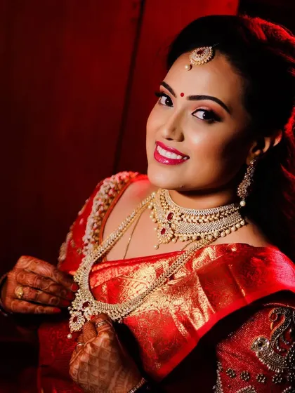 Swathi's happy smile says it all. It was a joy to create this glamorous reception look for such a sweet and happy bride.