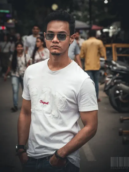 I love the challenge of an impromptu street portrait. This shot was taken on a busy Bangalore street, using natural light to create a moody, focused look that makes the subject stand out from the crowd. It’s about finding stories in plain sight.