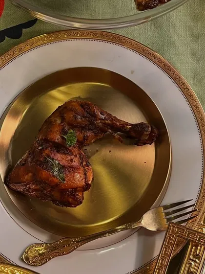 A hidden gem on my menu: Al Faham Chicken. This pan-roasted chicken is infused with Malayalee-Arabic spices, echoing the smoky charm of Gulf-return hotel feasts. It's a passport to a different Kerala.
