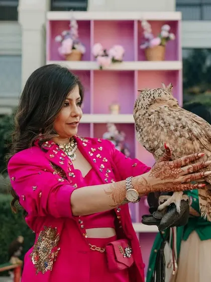 Adding some local Dubai vibes to the party. I arranged for a falcon booth, where guests could interact with these majestic birds for a truly unique photo opportunity.