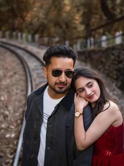 A quiet, intimate moment of rest along the tracks. This close-up highlights the gentle and supportive nature of their relationship.