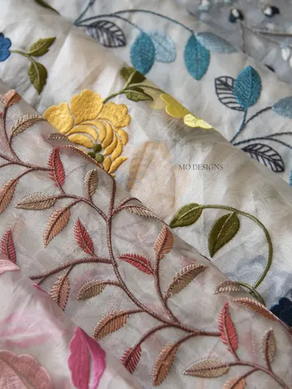 Our beautiful sheer fabrics with colorful floral embroidery. This lightweight material offers a soft, luxurious drape and allows for soft, filtered light, perfect for an elegant finishing touch.