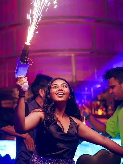 It's all about creating those picture perfect, high energy moments. Using props like cold pyro guns adds that extra spark to the night, making it a memorable one for everyone.
