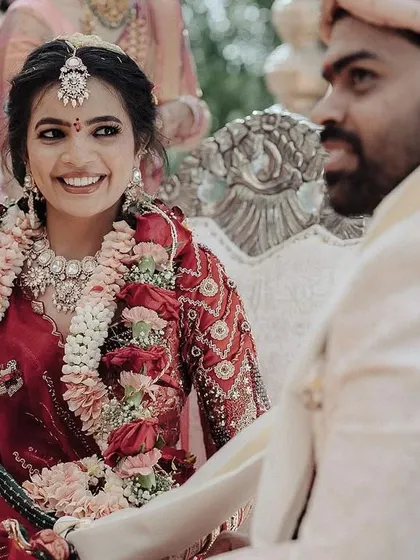A sweet, stolen glance between the bride and groom during their ceremony. These fleeting looks are the small, intimate details that I love to capture, telling a story of their connection.