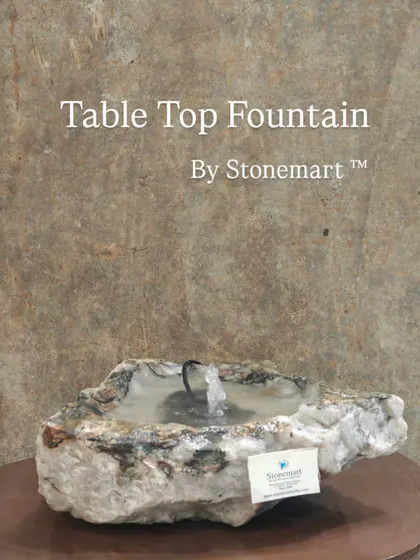 This tabletop fountain is made from a hollowed-out natural rock, making each piece completely unique.