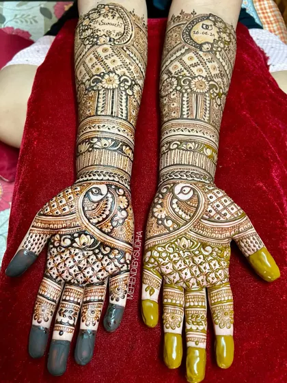 The complete engagement set for Ruchita, with matching peacock designs and personalized with her and her fiancé's names.