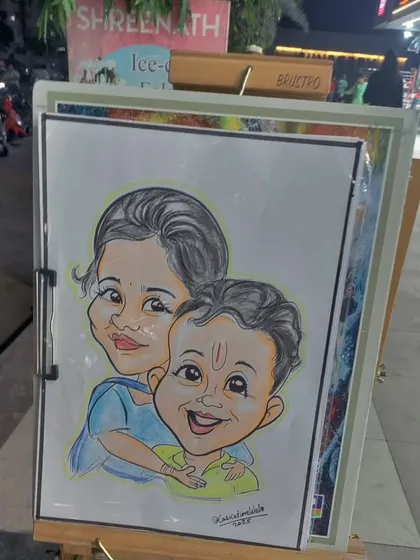 A sweet color caricature of a mother and child. These portraits make for a very special and personal keepsake.