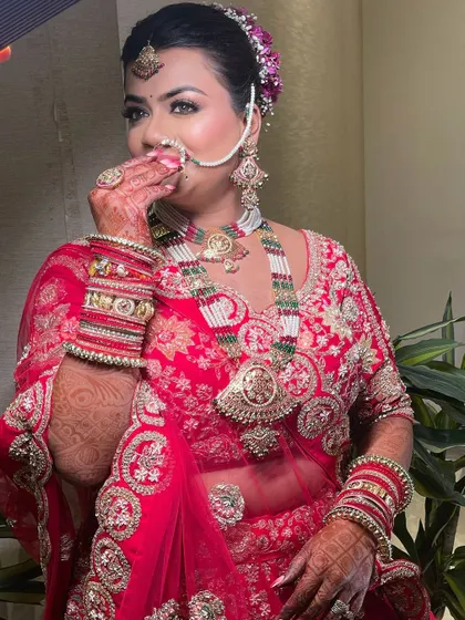 That beautiful bridal smile says it all. Her makeup was designed to be timeless, with a soft glow that enhances her features without overpowering her natural beauty.
