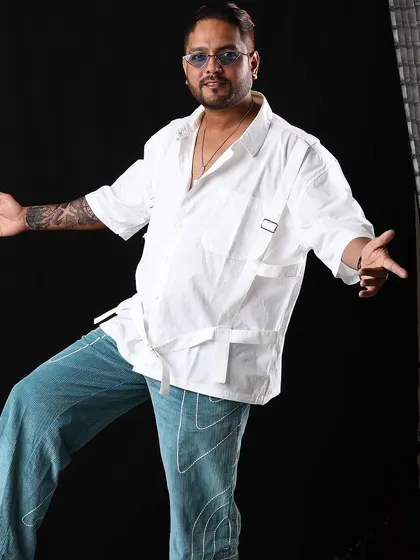 A fun, dynamic pose from a studio photoshoot. I like to keep my style versatile and expressive, just like my music.