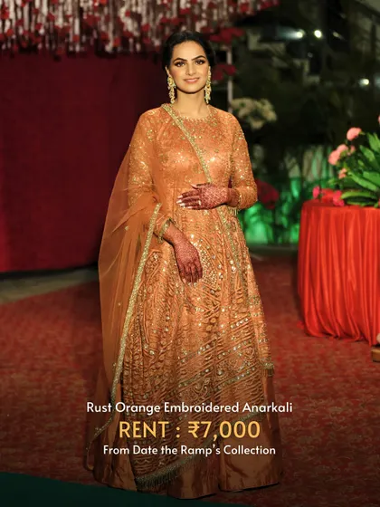 This rust orange embroidered Anarkali is comfortable yet glamorous, making it ideal for festive gatherings.