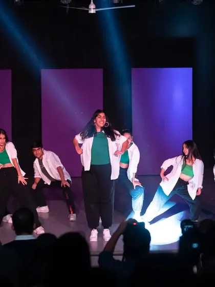 A dynamic shot of a student group mid-performance. The energy they brought to the stage was electric.
