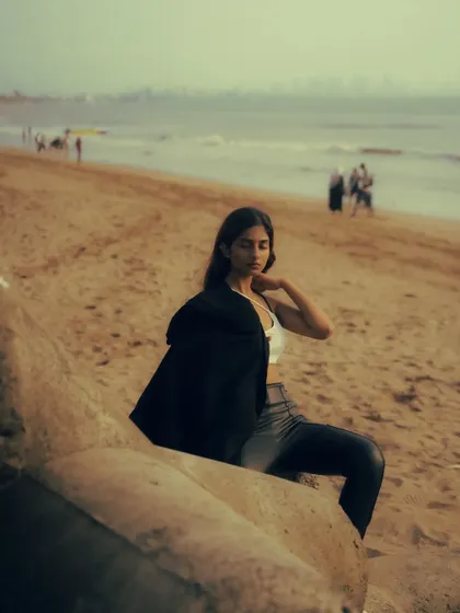 An editorial-style beach shoot with an edgy, high-fashion look. The mix of color and black and white images shows the versatility of a single location.