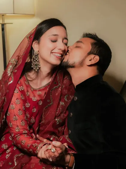 A sweet kiss from the groom. These are the moments I love to see, where the bride feels so comfortable and happy in her skin and her look.