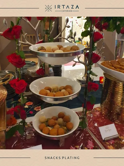 A tiered platter showcasing a variety of bite-sized snacks. This type of display is great for encouraging guests to try a little bit of everything.